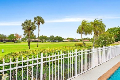 Located in the highly sought-after Boca Woods Country Club, this on Boca Woods Country Club in Florida - for sale on GolfHomes.com, golf home, golf lot