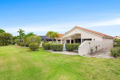 Located in the highly sought-after Boca Woods Country Club, this on Boca Woods Country Club in Florida - for sale on GolfHomes.com, golf home, golf lot