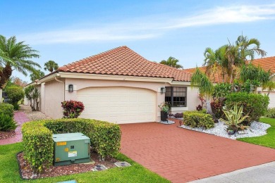 Located in the highly sought-after Boca Woods Country Club, this on Boca Woods Country Club in Florida - for sale on GolfHomes.com, golf home, golf lot