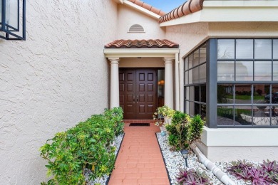 Located in the highly sought-after Boca Woods Country Club, this on Boca Woods Country Club in Florida - for sale on GolfHomes.com, golf home, golf lot