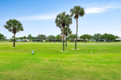 Located in the highly sought-after Boca Woods Country Club, this on Boca Woods Country Club in Florida - for sale on GolfHomes.com, golf home, golf lot