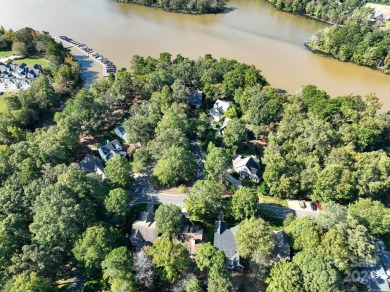 Don't miss this beautiful cottage in the desirable Millingport on Old North State Club at Uwharrie Point Golf community in North Carolina - for sale on GolfHomes.com, golf home, golf lot