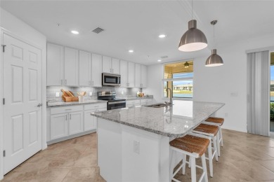 This exquisite FIRST FLOOR COACH home is just steps from one of on Heritage Landing Golf  in Florida - for sale on GolfHomes.com, golf home, golf lot