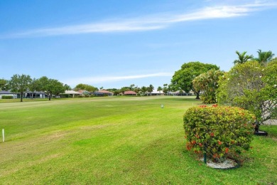 Located in the highly sought-after Boca Woods Country Club, this on Boca Woods Country Club in Florida - for sale on GolfHomes.com, golf home, golf lot