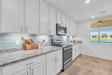 This exquisite FIRST FLOOR COACH home is just steps from one of on Heritage Landing Golf  in Florida - for sale on GolfHomes.com, golf home, golf lot