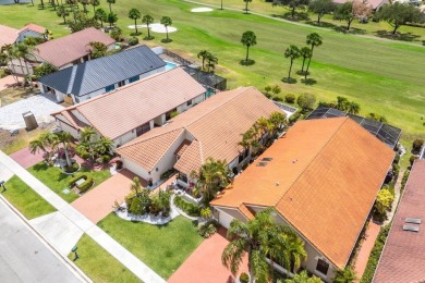Located in the highly sought-after Boca Woods Country Club, this on Boca Woods Country Club in Florida - for sale on GolfHomes.com, golf home, golf lot