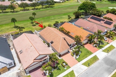Located in the highly sought-after Boca Woods Country Club, this on Boca Woods Country Club in Florida - for sale on GolfHomes.com, golf home, golf lot