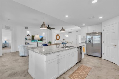 This exquisite FIRST FLOOR COACH home is just steps from one of on Heritage Landing Golf  in Florida - for sale on GolfHomes.com, golf home, golf lot