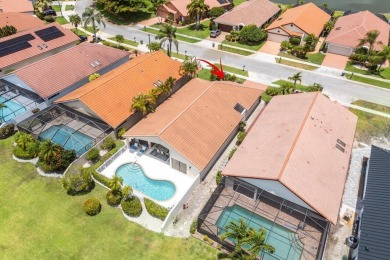 Located in the highly sought-after Boca Woods Country Club, this on Boca Woods Country Club in Florida - for sale on GolfHomes.com, golf home, golf lot