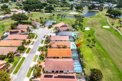 Located in the highly sought-after Boca Woods Country Club, this on Boca Woods Country Club in Florida - for sale on GolfHomes.com, golf home, golf lot