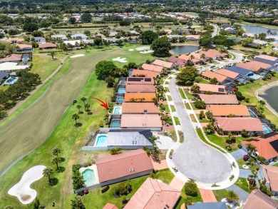 Located in the highly sought-after Boca Woods Country Club, this on Boca Woods Country Club in Florida - for sale on GolfHomes.com, golf home, golf lot