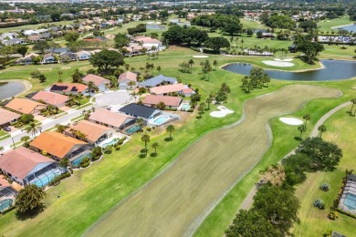 Located in the highly sought-after Boca Woods Country Club, this on Boca Woods Country Club in Florida - for sale on GolfHomes.com, golf home, golf lot
