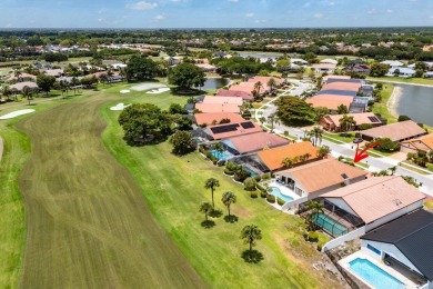 Located in the highly sought-after Boca Woods Country Club, this on Boca Woods Country Club in Florida - for sale on GolfHomes.com, golf home, golf lot