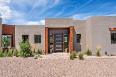 Nestled in the prestigious community of Las Campanas, 64 Calle on The Club At Las Campanas  in New Mexico - for sale on GolfHomes.com, golf home, golf lot