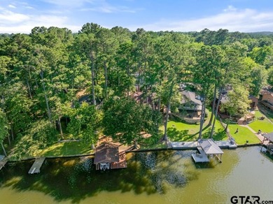 Enjoy breathtaking lake views from nearly every room in this on Hide-A-Way Lake Golf Course in Texas - for sale on GolfHomes.com, golf home, golf lot