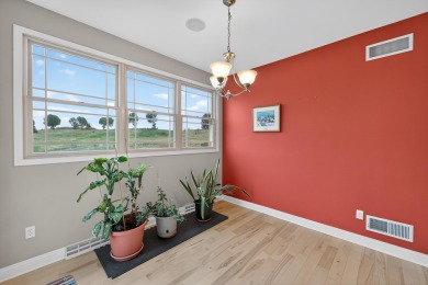 Discover this beautifully updated 4-bedroom, 3.5-bath home in on Hawks Landing Golf Club in Wisconsin - for sale on GolfHomes.com, golf home, golf lot