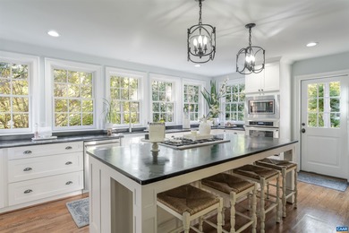 Stately Brick Home nestled on half an acre bordering acres of on Glenmore Country Club in Virginia - for sale on GolfHomes.com, golf home, golf lot