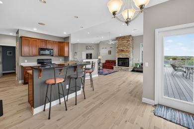 Discover this beautifully updated 4-bedroom, 3.5-bath home in on Hawks Landing Golf Club in Wisconsin - for sale on GolfHomes.com, golf home, golf lot