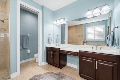 MOVE-IN READY | MAJOR UPGRADES | GOLF & WATER VIEWS! This on Herons Glen Golf and Country Club in Florida - for sale on GolfHomes.com, golf home, golf lot