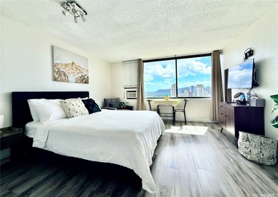 Stunning high floor one bedroom condo at Waikiki Hawaiian on Ala Wai Golf Course in Hawaii - for sale on GolfHomes.com, golf home, golf lot