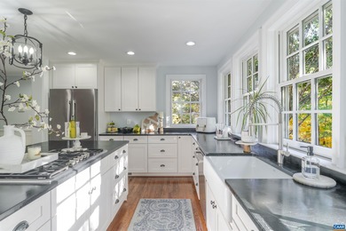 Stately Brick Home nestled on half an acre bordering acres of on Glenmore Country Club in Virginia - for sale on GolfHomes.com, golf home, golf lot