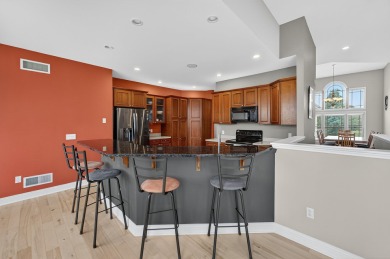 Discover this beautifully updated 4-bedroom, 3.5-bath home in on Hawks Landing Golf Club in Wisconsin - for sale on GolfHomes.com, golf home, golf lot