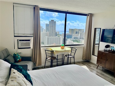 Stunning high floor one bedroom condo at Waikiki Hawaiian on Ala Wai Golf Course in Hawaii - for sale on GolfHomes.com, golf home, golf lot