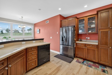 Discover this beautifully updated 4-bedroom, 3.5-bath home in on Hawks Landing Golf Club in Wisconsin - for sale on GolfHomes.com, golf home, golf lot
