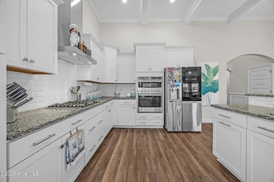 Experience refined coastal living in this rare Evans Park beauty on International Club of Myrtle Beach in South Carolina - for sale on GolfHomes.com, golf home, golf lot