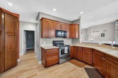 Discover this beautifully updated 4-bedroom, 3.5-bath home in on Hawks Landing Golf Club in Wisconsin - for sale on GolfHomes.com, golf home, golf lot