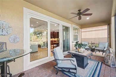 MOVE-IN READY | MAJOR UPGRADES | GOLF & WATER VIEWS! This on Herons Glen Golf and Country Club in Florida - for sale on GolfHomes.com, golf home, golf lot