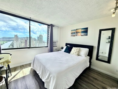 Stunning high floor one bedroom condo at Waikiki Hawaiian on Ala Wai Golf Course in Hawaii - for sale on GolfHomes.com, golf home, golf lot