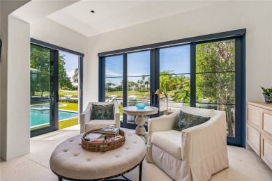 Stunning Orchid Island home with beautiful golf view of the14th on Orchid Island Golf and Beach Club in Florida - for sale on GolfHomes.com, golf home, golf lot