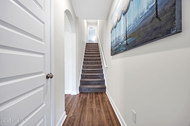 Experience refined coastal living in this rare Evans Park beauty on International Club of Myrtle Beach in South Carolina - for sale on GolfHomes.com, golf home, golf lot