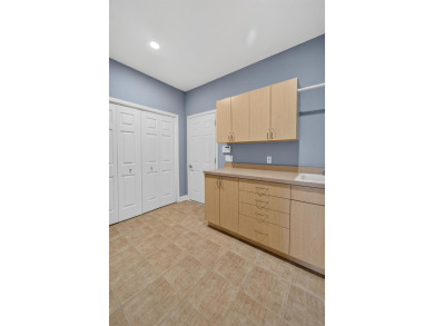 Discover this beautifully updated 4-bedroom, 3.5-bath home in on Hawks Landing Golf Club in Wisconsin - for sale on GolfHomes.com, golf home, golf lot