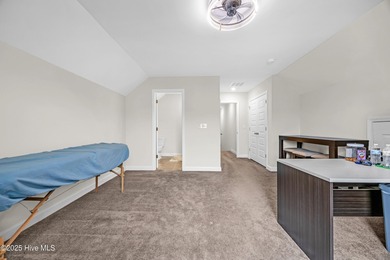 Experience refined coastal living in this rare Evans Park beauty on International Club of Myrtle Beach in South Carolina - for sale on GolfHomes.com, golf home, golf lot