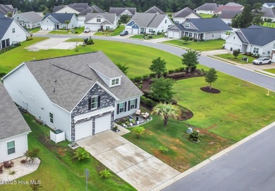 Experience refined coastal living in this rare Evans Park beauty on International Club of Myrtle Beach in South Carolina - for sale on GolfHomes.com, golf home, golf lot
