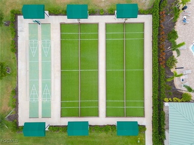 MOVE-IN READY | MAJOR UPGRADES | GOLF & WATER VIEWS! This on Herons Glen Golf and Country Club in Florida - for sale on GolfHomes.com, golf home, golf lot