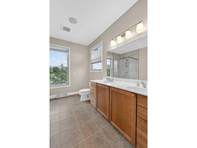 Discover this beautifully updated 4-bedroom, 3.5-bath home in on Hawks Landing Golf Club in Wisconsin - for sale on GolfHomes.com, golf home, golf lot