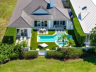 Stunning Orchid Island home with beautiful golf view of the14th on Orchid Island Golf and Beach Club in Florida - for sale on GolfHomes.com, golf home, golf lot