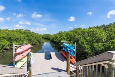 Stunning Orchid Island home with beautiful golf view of the14th on Orchid Island Golf and Beach Club in Florida - for sale on GolfHomes.com, golf home, golf lot
