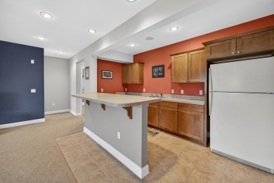 Discover this beautifully updated 4-bedroom, 3.5-bath home in on Hawks Landing Golf Club in Wisconsin - for sale on GolfHomes.com, golf home, golf lot
