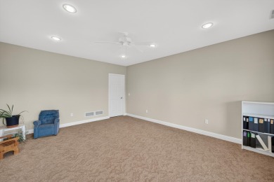 Discover this beautifully updated 4-bedroom, 3.5-bath home in on Hawks Landing Golf Club in Wisconsin - for sale on GolfHomes.com, golf home, golf lot