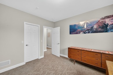 Discover this beautifully updated 4-bedroom, 3.5-bath home in on Hawks Landing Golf Club in Wisconsin - for sale on GolfHomes.com, golf home, golf lot