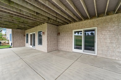 Discover this beautifully updated 4-bedroom, 3.5-bath home in on Hawks Landing Golf Club in Wisconsin - for sale on GolfHomes.com, golf home, golf lot