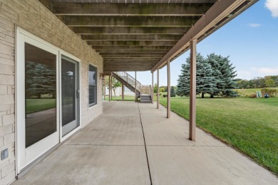 Discover this beautifully updated 4-bedroom, 3.5-bath home in on Hawks Landing Golf Club in Wisconsin - for sale on GolfHomes.com, golf home, golf lot