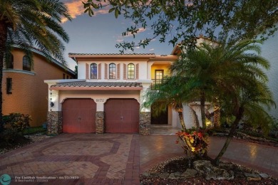 Exquisite 2-story pool home w/serene lake views in the on Parkland Golf Club in Florida - for sale on GolfHomes.com, golf home, golf lot