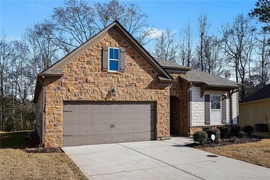 Hidden at the end of a quiet cul-de-sac in Heron Bay Villas on Canongate At Heron Bay in Georgia - for sale on GolfHomes.com, golf home, golf lot