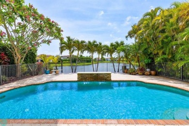 Exquisite 2-story pool home w/serene lake views in the on Parkland Golf Club in Florida - for sale on GolfHomes.com, golf home, golf lot
