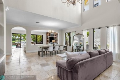Exquisite 2-story pool home w/serene lake views in the on Parkland Golf Club in Florida - for sale on GolfHomes.com, golf home, golf lot